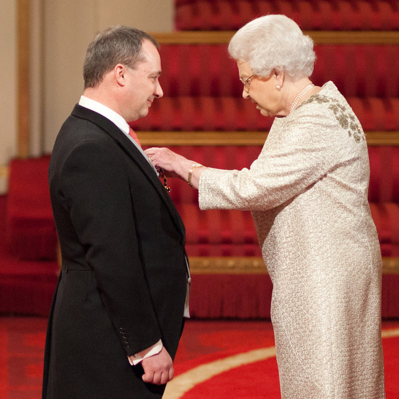 Richard Wilding receiving his OBE